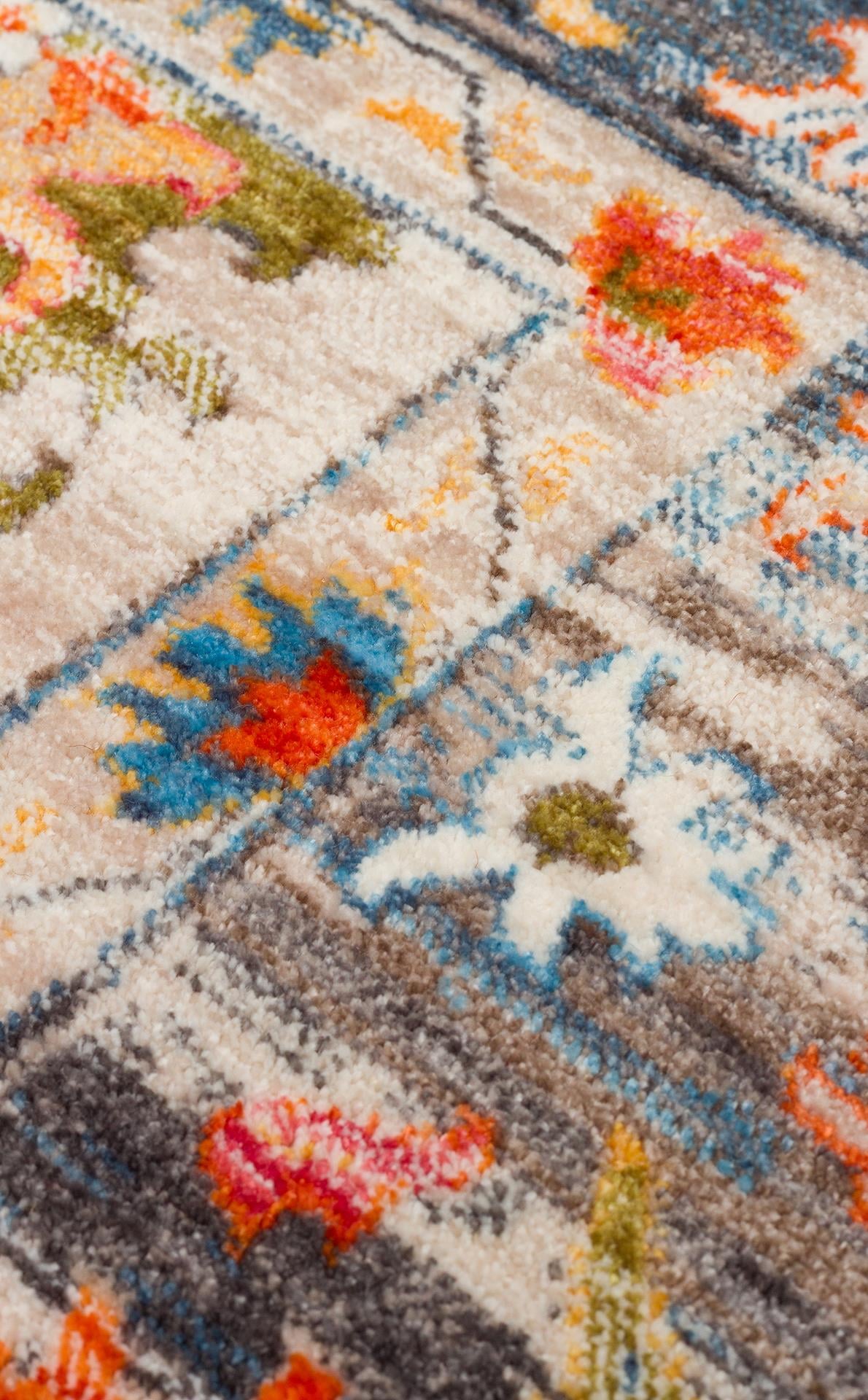 PIETRA PTA 19 BEIGE MULTY Sıcak Renk Tonlarını Etnik Desenler ile Buluşturan Yumuşak Tuşeli Makine Halısı