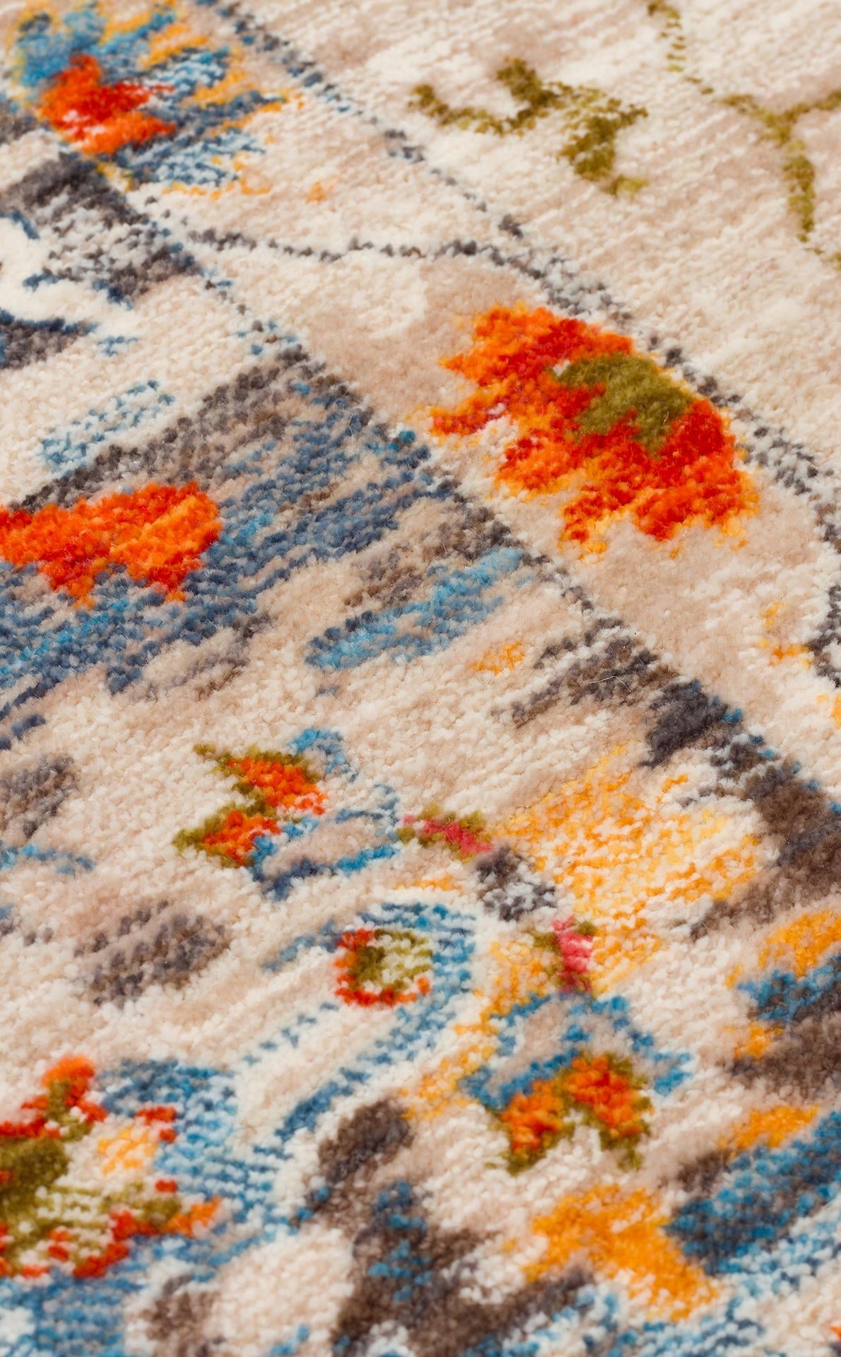 PIETRA PTA 19 BEIGE MULTY Sıcak Renk Tonlarını Etnik Desenler ile Buluşturan Yumuşak Tuşeli Makine Halısı