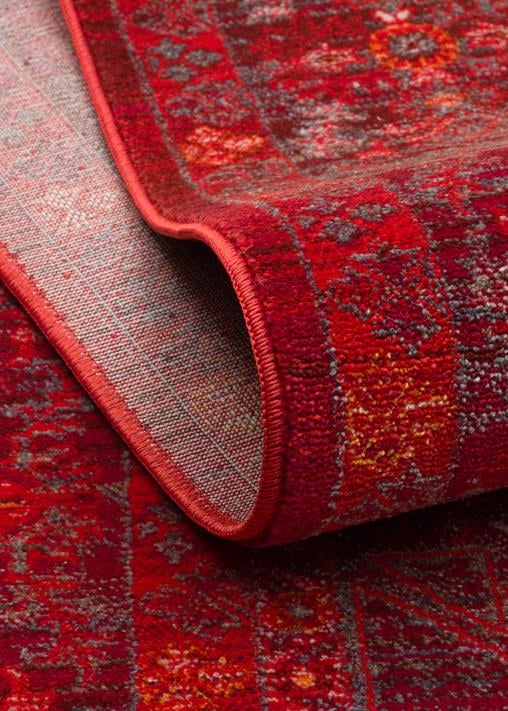 PIETRA PTA 20 RED Sıcak Renk Tonlarını Etnik Desenler ile Buluşturan Yumuşak Tuşeli Makine Halısı