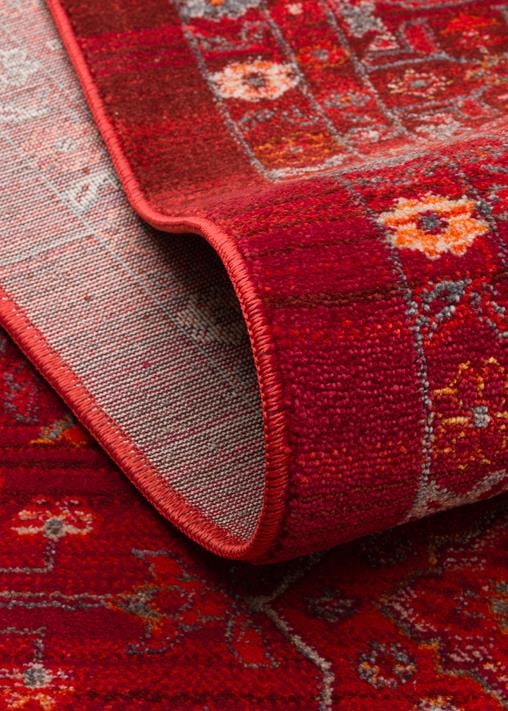 PIETRA PTA 21 RED Sıcak Renk Tonlarını Etnik Desenler ile Buluşturan Yumuşak Tuşeli Makine Halısı